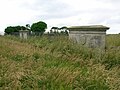 The cemetery garden railings and walls frontage.