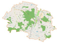 Mapa konturowa gminy Poddębice, na dole znajduje się punkt z opisem „Busina”