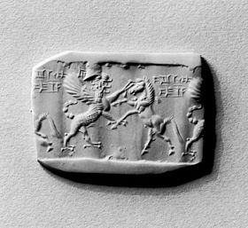 Cylinder seal usage of the i sign (part of ia (cuneiform)) (had to be inscribed in-reverse to appear in clay impression correctly).