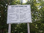 A sign that presents information about the dam and its construction