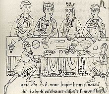 Enluminure représentant des convives autour d'une table