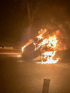 Подожжённый автомобиль, Шампиньи, 30 июня 2023 года