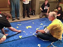 Mike Carr (in yellow) running Don't Give Up the Ship! at Gen Con Indy 2013.