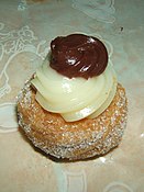 Zeppole is a pastry consisting of a deep-fried dough ball that is dusted with powdered sugar and sometimes filled with various sweets.