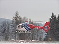 Kryštof 04 při sekundárním letu na heliportu ve Valašském Meziříčí (OK-NIK)