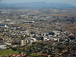 Bellville CBD with Kogelberg Mountains and False Bay in distance