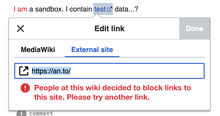 Screenshot showing the feedback people will receive when attempting to link to a blocked domain within the visual editor.