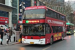 A double-decker bus on Route 12 at the north terminus on east plaza