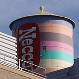 The water tower of the Necco facility on Massachusetts Avenue in Cambridge, Massachusetts, painted in 1996 to resemble a roll of Necco Wafers.[3]