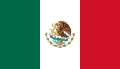 The flag of Mexico, a charged vertical triband.