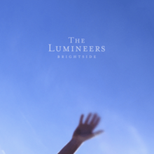 The cover consists of a bright blue sky with a blurred image of a hand. The band's name and album title are colored in white.