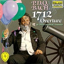 A roughed-up man holding balloons, a cannon sitting next to him, the words "P.D.Q. Bach, 1712 Overture" above him