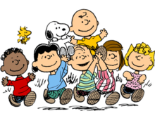 The characters from Peanuts holding aloft Charlie Brown and Snoopy.