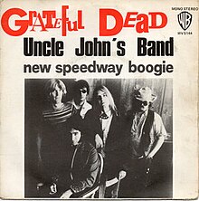 A single sleeve for the Grateful Dead single 'Uncle John's Band', backed with 'New Speedway Boogie'. The band's name is displayed in mixed-font text at the top of the sleeve, with the two song names below in title capitalization and no capitalization, respectively. An image of the band is below the two song names. The Warner Bros. logo, along with 'MONO STEREO' and 'WV5144', is in the upper right.