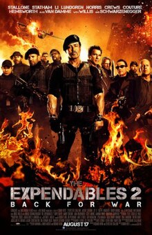 Movie poster with vehicles on fire and a soldier aiming a handgun