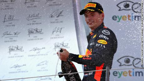 Race winner Max Verstappen of Netherlands and Red Bull Racing celebrates on the podium during the Formula One Grand Prix of Austria.