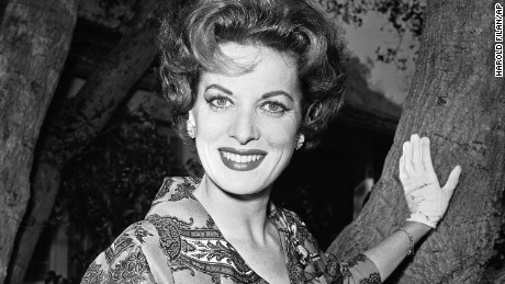 FILE - This Jan. 19, 1960 file photo shows movie actress Maureen O&#39;Hara photographed in her front yard in Los Angeles. O&#39;Hara,who appeared in such classic films as &quot;The Quiet Man and How Green Was My Valley,&quot; has died. Her manager says OHara died in her sleep Saturday, Oct. 24, 2015 at her home in Boise, Idaho.  (AP Photo/Harold Filan,File)