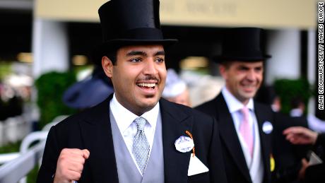 ASCOT, ENGLAND - JUNE 18:   Sheikh Fahad al Thani, head of Qatar Racing celebrates during day one of Royal Ascot at Ascot Racecourse on June 18, 2013 in Ascot, England.  (Photo by Alan Crowhurst/Getty Images for Ascot Racecourse)