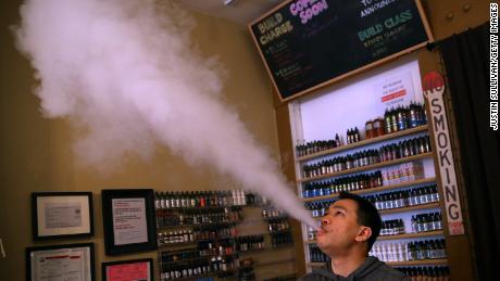 SAN FRANCISCO, CA - MAY 05:  Christopher Chin blows vapor from an e-cigarette at Gone With the Smoke Vapor Lounge on May 5, 2016 in San Francisco, California. The U.S. Food and Drug Administration announced new federal regulations on electronic cigarettes that will be the same as traditional tobacco cigarettes and chewing tobacco.  (Photo by Justin Sullivan/Getty Images)
