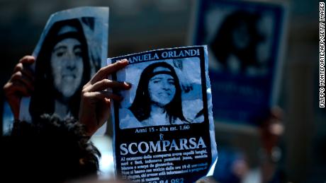 A demonstrator holds a poster of Emanuela Orlandi reading &quot;Missing&quot; during Pope Benedict XVI&#39;s Regina Coeli noon prayer in St. Peter&#39;s square, at the Vatican on May 27, 2012. Fifteen-year-old Emanuela Orlandi, the daughter of a Vatican messenger who lived with his family in Vatican City, disappeared 25 years ago (June 22, 1983) when she went to a music lesson..   AFP PHOTO/ FILIPPO MONTEFORTE        (Photo credit should read FILIPPO MONTEFORTE/AFP/GettyImages)