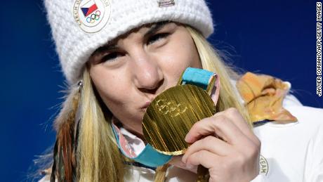 TOPSHOT - Czech Republic&#39;s gold medallist Ester Ledecka kisses her medal on the podium during the medal ceremony for the alpine skiing women&#39;s Super-G at the Pyeongchang Medals Plaza during the Pyeongchang 2018 Winter Olympic Games in Pyeongchang on February 17, 2018. / AFP PHOTO / JAVIER SORIANO        (Photo credit should read JAVIER SORIANO/AFP/Getty Images)