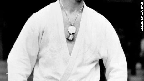 Anton Geesink from Netherlands, poses wearing the gold medal he won in the Judo Open event at the Olympic Games in Tokyo, October 1964.  World champion in 1961 and 1965 the giant (2-metre) Dutchman won the European title for individuals 13 times. / AFP PHOTO / -        (Photo credit should read -/AFP/Getty Images)