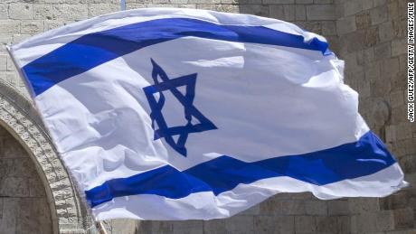 Israeli youths wave their national flag as they take part in the &quot;flag march&quot; through Damascus Gate in Jerusalem&#39;s old city during celebrations for Jerusalem Day on May 17, 2015 which marks the anniversary of the &quot;reunification&quot; of the holy city after Israel captured the Arab eastern sector from Jordan during the 1967 Six-Day War. AFP PHOTO / JACK GUEZ        (Photo credit should read JACK GUEZ/AFP/Getty Images)