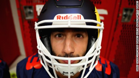 AUSTIN, TX - OCTOBER 19: Daniel Ricciardo of Australia and Red Bull Racing prepares for a training session with the Del Valle Cardinals High School Football Team during previews ahead of the United States Formula One Grand Prix at Circuit of The Americas on October 19, 2017 in Austin, Texas.  (Photo by Mark Thompson/Getty Images)