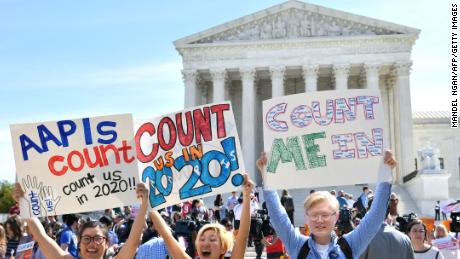 Demonstrators rally at the US Supreme Court in Washington, DC, on April 23, 2019, to protest a proposal to add a citizenship question in the 2020 Census. - In March 2018, US Secretary of Commerce Wilbur Ross announced he was going to reintroduce for the 2020 census a question on citizenship abandoned more than 60 years ago. The decision sparked an uproar among Democrats and defenders of migrants -- who have come under repeated attack from an administration that has made clamping down on illegal migration a hallmark as President Donald Trump seeks re-election in 2020. (Photo by MANDEL NGAN / AFP)        (Photo credit should read MANDEL NGAN/AFP/Getty Images)