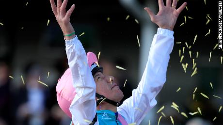 LOUISVILLE, KY - NOVEMBER 03:  Lanfranco Dettori the jockey of Expert Eye celebrates after winning the Breeders&#39; Cup Mile during day 2 of the Breeders&#39; Cup at Churchill Downs on November 3, 2018 in Louisville, Kentucky.  (Photo by Andy Lyons/Getty Images)