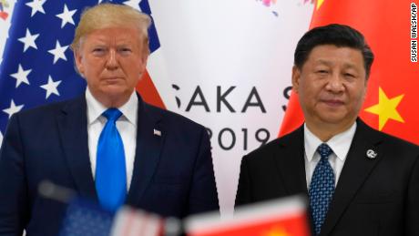 President Donald Trump, left, poses for a photo with Chinese President Xi Jinping during a meeting on the sidelines of the G-20 summit in Osaka, Japan, Saturday, June 29, 2019. (AP Photo/Susan Walsh)