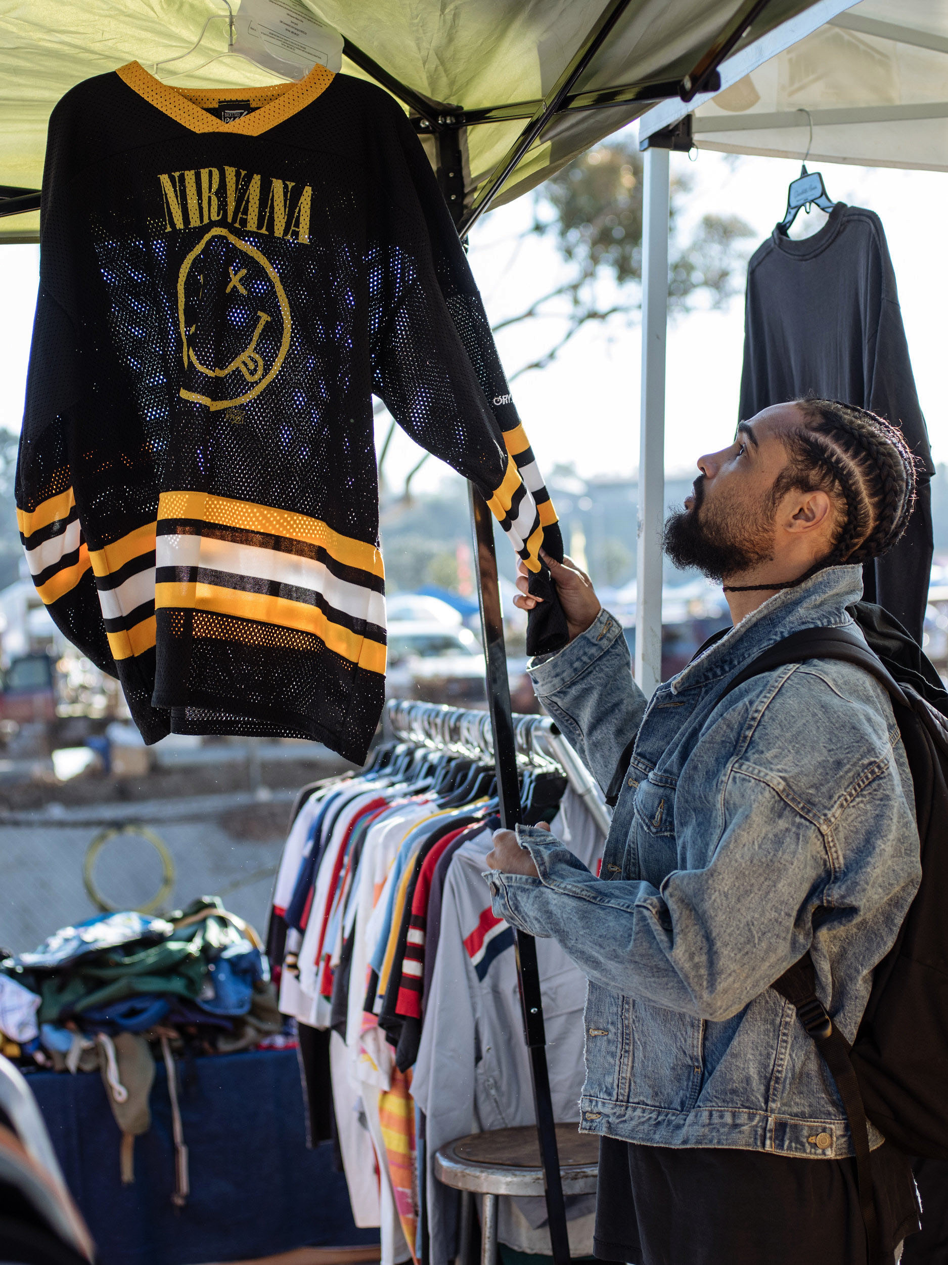 “I’m going to wear most of this stuff from today,” he said, debating whether to buy a commemorative black mesh Nirvana shirt.