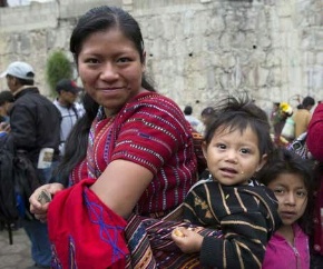 Date: 12/21/2015 Description: Maya Indian woman with baby in Lake Atitlan, Guatemala, Central America. © Papa Bravo for Shuttersotck.com