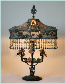 Antique tole lamp with lace shade