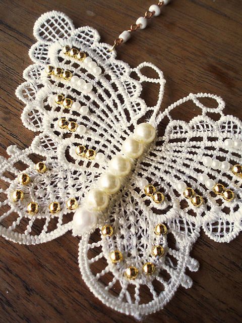 butterfly lace with pearls.