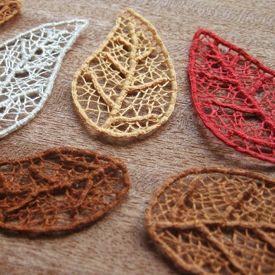 Make your own skeleton leaves with this needle lace technique - all it takes is some embroidery floss, sewing thread, and a paper template!