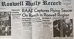 Newspaper headline reads, "RAAF Captures Flying Saucer on Ranch in Roswell Region". Full text is available on linked page.