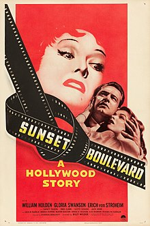 A predominantly red illustration of an older woman's wrathful, enraged face looming large over a frightened younger couple; the title 'Sunset Boulevard' is displayed over a strip of celluloid film tied in a knot.