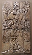 Ассирийский рельеф с изображением крылатого духа в позе благословления