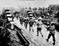 Американские солдаты пересекают линию Зигфрида и двигаются в Германию.