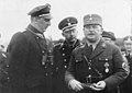 Эрнст Рём (справа) в компании с Генрихом Гиммлером (в центре) и Куртом Далюге (слева). Август 1933 г.
