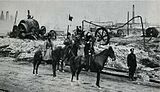 Казачий патруль возле нефтепромыслов в Баку, сожжённых во время Армяно-татарской резни. 1905.
