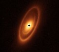 Image 15Astronomers used the James Webb Space Telescope to image the warm dust around a nearby young star, Fomalhaut, in order to study the first asteroid belt ever seen outside of the Solar System in infrared light. (from Cosmic dust)