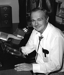 Eugene Shoemaker at a stereoscopic microscope