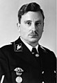 Эмиль Морис первый Верховный вождь СА, с 1920 по 1921 год, на фото представленный в униформе Оберфюрера СС (недатированная фотография, вероятно, между 1934 и 1937).
