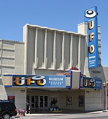 Exterior photograph of building with sign reading UFO Museum and Research Center