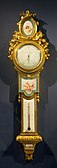 Louis XVI style barometer-thermometer; c. 1776; soft-paste Sèvres porcelain, enamel, and ormolu; height: 1 m, width: 0.27 m[98]