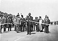 Image 19Ribbon ceremony to open the Sydney Harbour Bridge on 20 March 1932. Breaking protocol, the soon to be dismissed Premier Jack Lang cuts the ribbon while Governor Philip Game looks on. (from History of New South Wales)