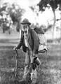 Image 49A swagman in bushman's apparel, wearing a brimmed hat and carrying swag, and billy can. (from Culture of Australia)