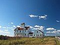 Casa em Cabo Cod, onde Hopper passou alguns Verões, a lembrar uma pintura de 1927: "Coast Guard Station".